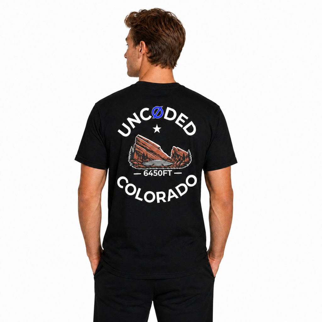 Model wearing UNCØDED 6450 Ridge Tee black Colorado graphic tee back design