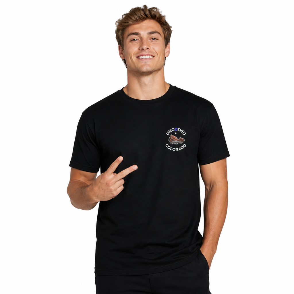 Model wearing UNCØDED 6450 Ridge Tee black Colorado graphic tee front view