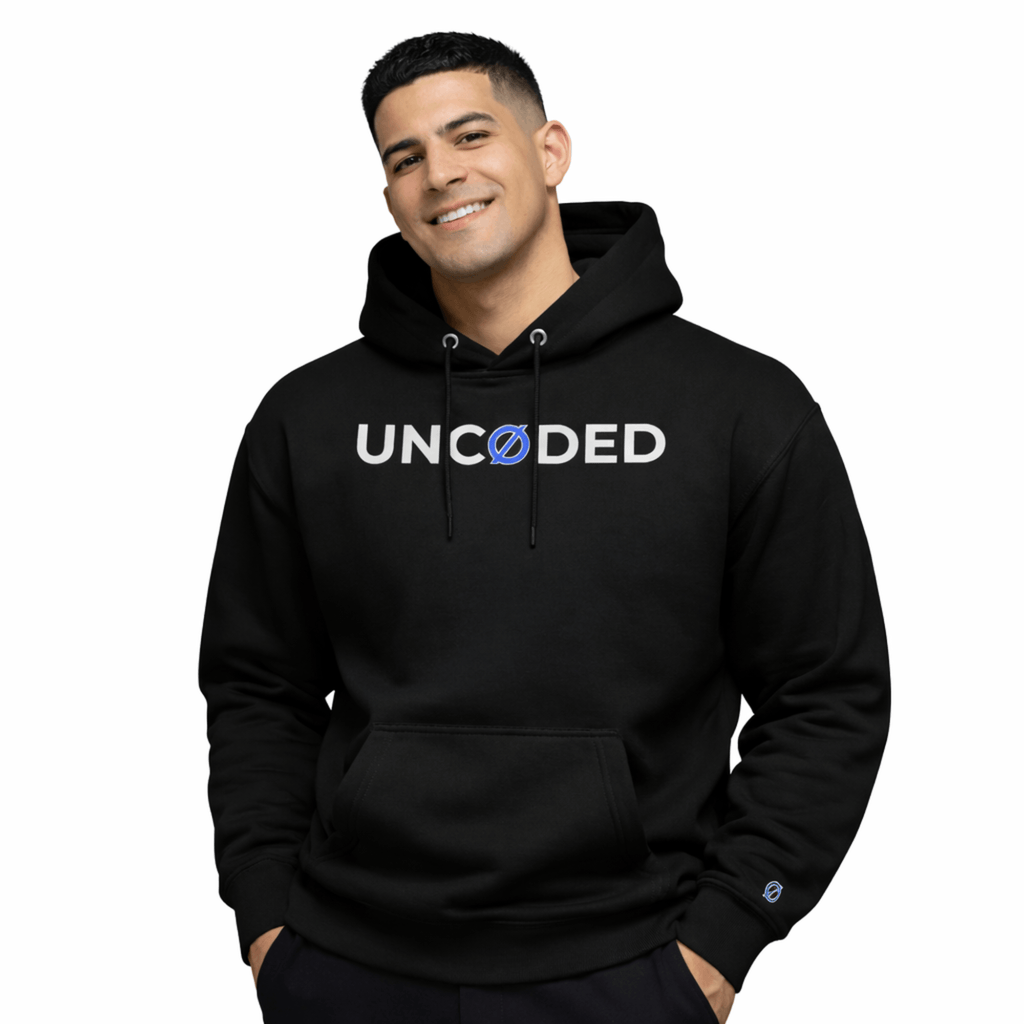 Model wearing UNCØDED Signature Hoodie black minimal streetwear hoodie front view #group:black
