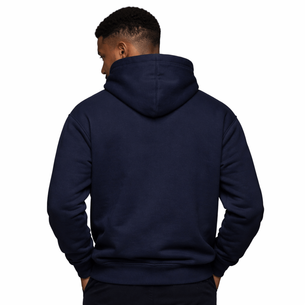 Model wearing UNCØDED Signature Hoodie navy minimal streetwear hoodie back view #group:navy