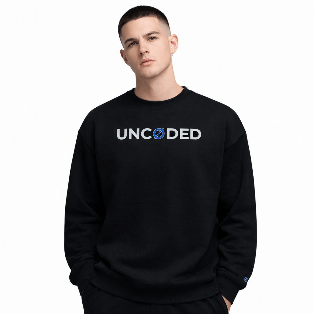 Model wearing UNCØDED Signature Sweatshirt black minimal streetwear crewneck front view #group:black